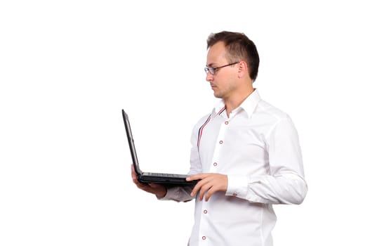 Businessman holding a laptop on a white background