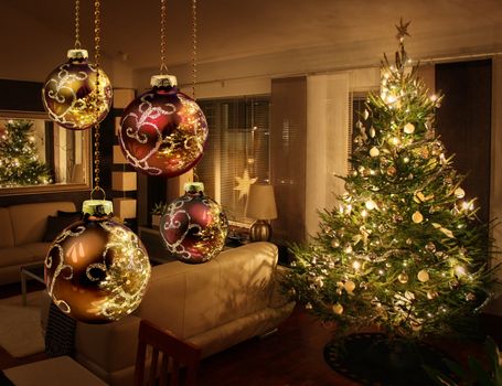 Christmas tree lights reflecting from glass balls and mirror