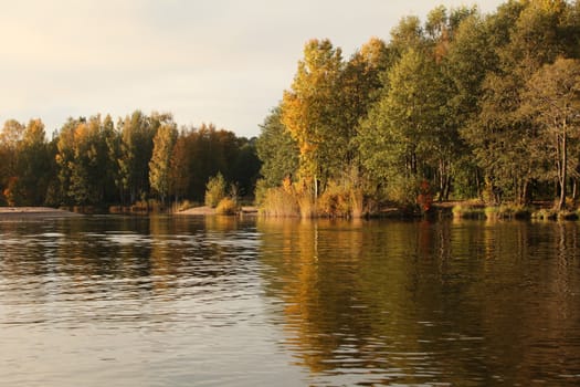 Autumn trees reflecting off the water