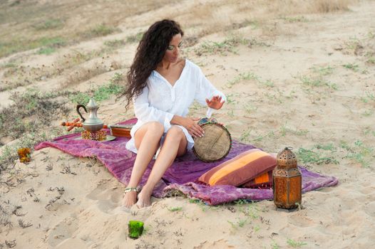 Hispanic woman in a classic African setting