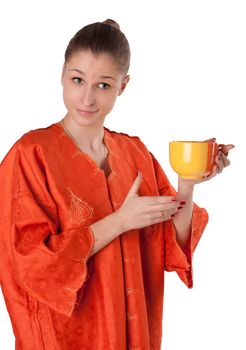 The girl in the orange robe offers tea studio photography