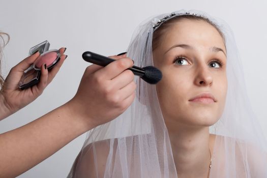 Bride close-ups and make-up artist make-up
