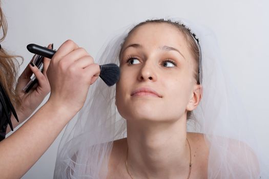 Bride close-ups and make-up artist make-up