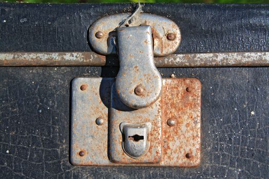 rusty lock on old valise