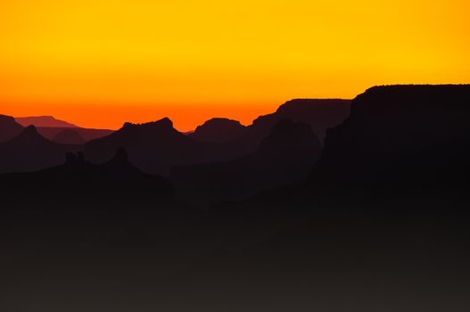 Grand canyon orange and yellow silhouette sunset, Arizona, USA