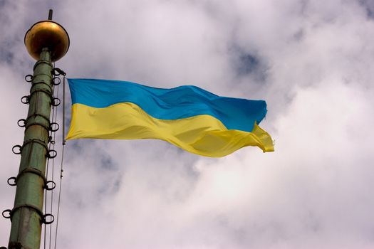Flag of Ukraine is developing in the sky