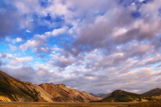 Landmannalaugar colorful mountains landscape view with clouds, Iceland