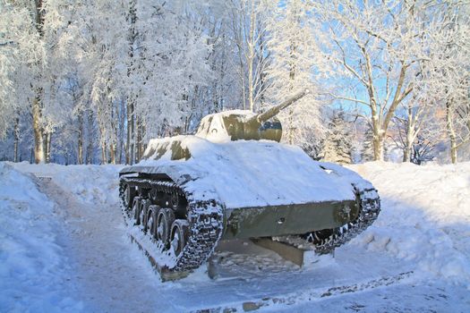 old tank fallen asleep by snow