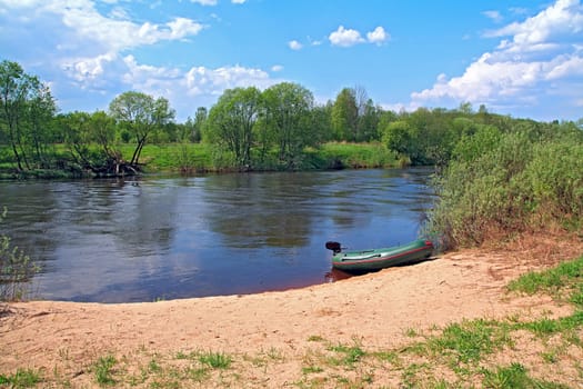 motor boat on river coast