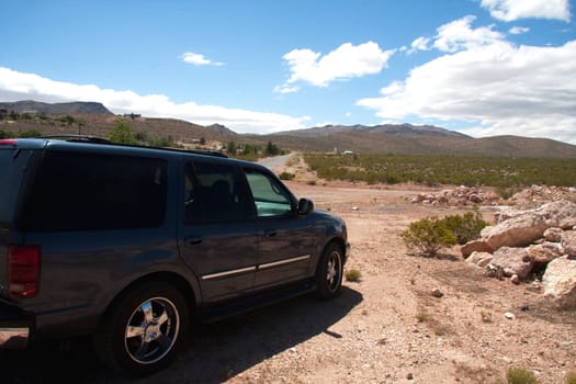 tourist car parked in the Nevada desert in Goldfield,NV