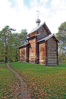 wooden chapel in autumn wood
