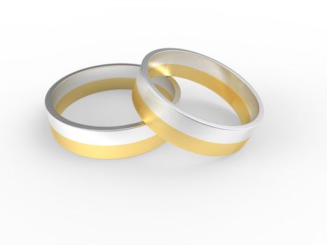 Golden and silver wedding rings isolated on white background