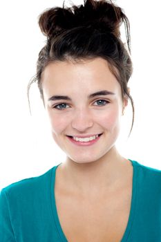 Closeup profile shot of an attractive teenager with fancy hair style