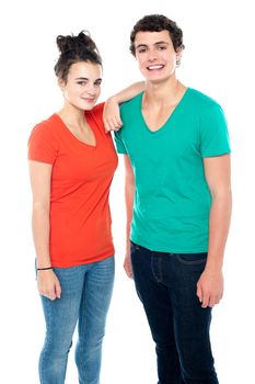 Adorable teenage couple in casuals isolated on white background