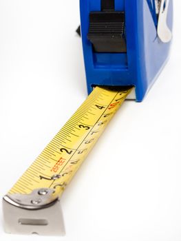 Isolated tape measure against a white background. 