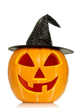 Funny Halloween pumpkin with black hat isolated on white background