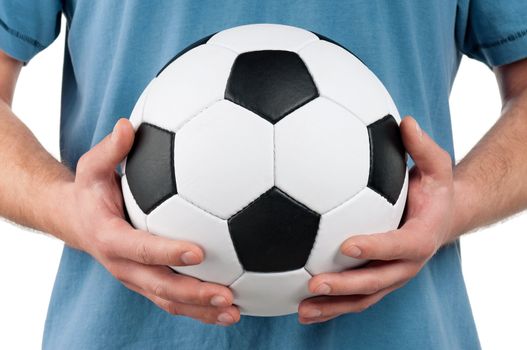 Man standing with classic soccer ball on isolated white background