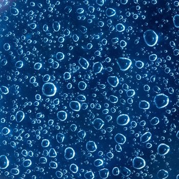 Water drops on a glass surface