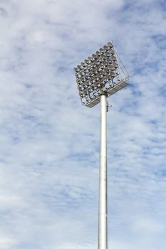 The Stadium Spot-light tower over Blue Sky