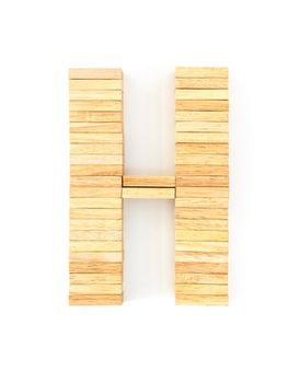 english alphabet  letters from wooden domino on white background, letter H