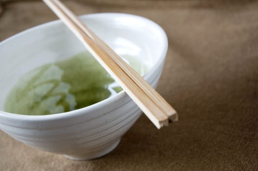 close up chopstick on japanese bowl