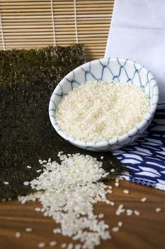 uncooked Japanese white rice in bowl