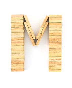 english alphabet  letters from wooden domino on white background, letter M