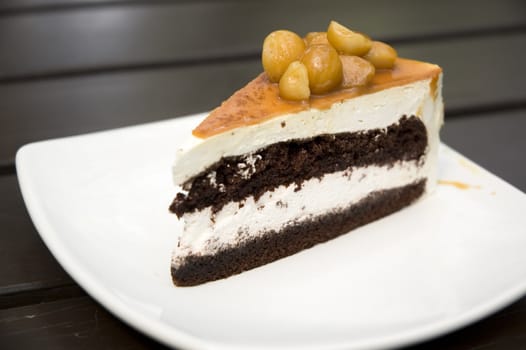 Macadamia cake on white plate.