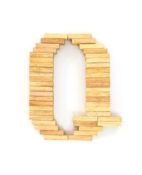 english alphabet  letters from wooden domino on white background, letter Q