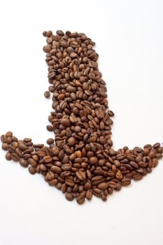 Arrow from coffee beans on white background