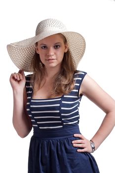 A girl in a straw hat, studio shot