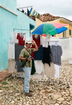 The photographer on a city street Trinidad. Cuba