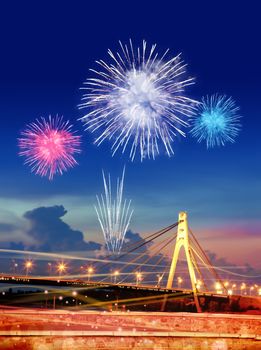 firework over Moskovsky bridge in Kiev city at night