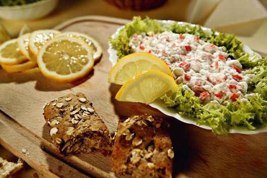 Crab dip with a lemon and fresh bread