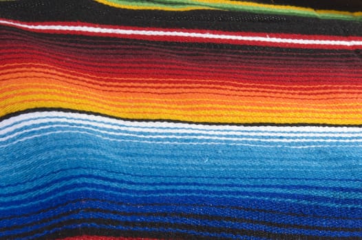 Colorful mexican poncho close up texture