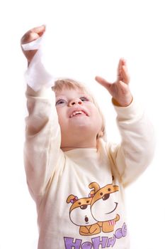 The little girl pulls the arms up on a white background