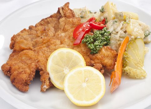 Vienna schnitzel with potato Vienna salad