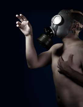 Scared, naked man with gas mask