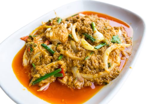 Isolated stir-fried crab with Garlic, Peper, Curry Powder on plate.