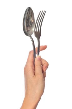 woman holding tablespoon and fork in the hand for lunch eating
