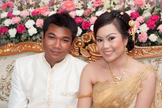 asian thai couple bride and bridegroom in thai wedding suit at wedding ceremony