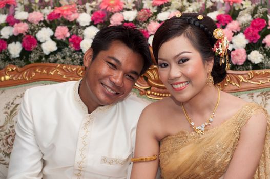 asian thai couple bride and bridegroom in thai wedding suit at wedding ceremony