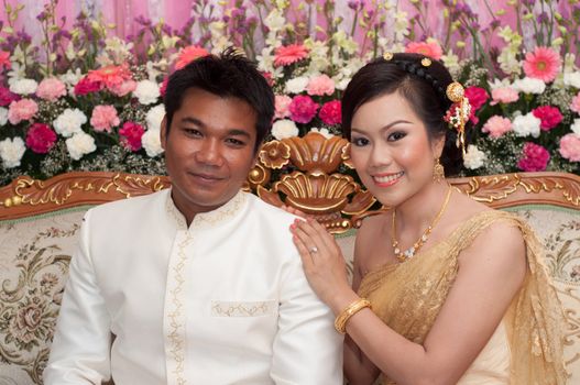 asian thai couple bride and bridegroom in thai wedding suit at wedding ceremony