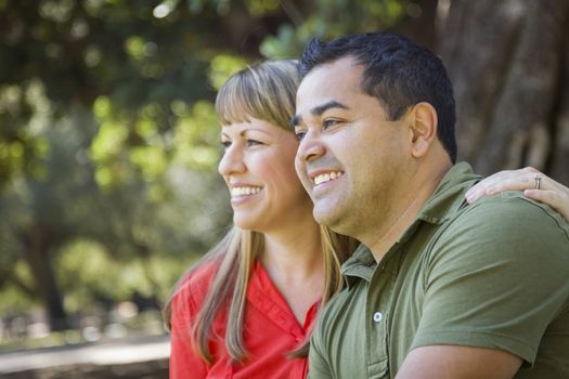 Happy Attractive Mixed Race Couple Portrait at the Park