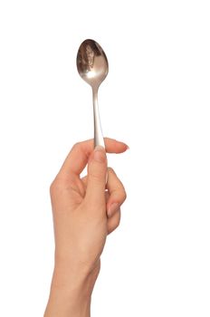 woman holding tablespoon in the hand for feeding a sick person