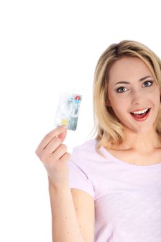 Studio shot of attractive smiling woman with a credit card isolated on white