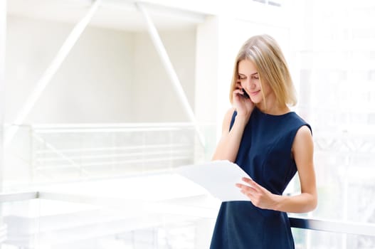 business woman holding reports , copy space