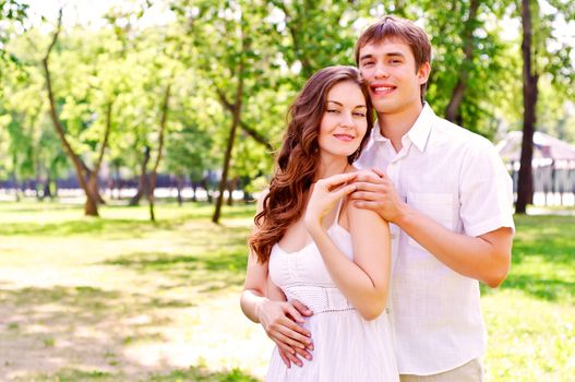 couple hugging in the park, have a good time together