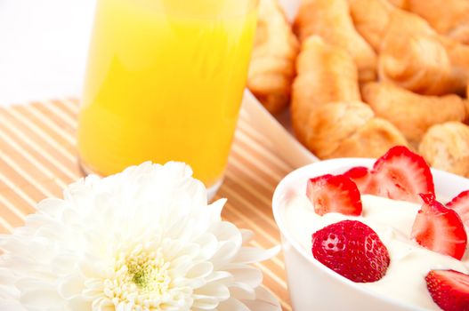 Breakfast with berries,orange juice and croissant, early breakfast