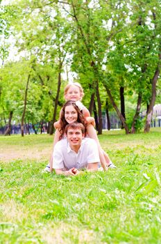 Family lying in the park, spend time with family